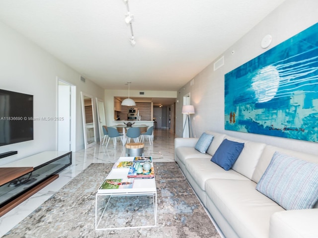 300 Sunny Isles Blvd Unit 5-1605, Sunny Isles Beach, FL 33160 - living area featuring light marble finish flooring