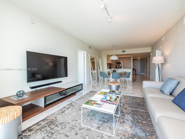 300 Sunny Isles Blvd Unit 5-1605, Sunny Isles Beach, FL 33160 - living room with marble finish flooring