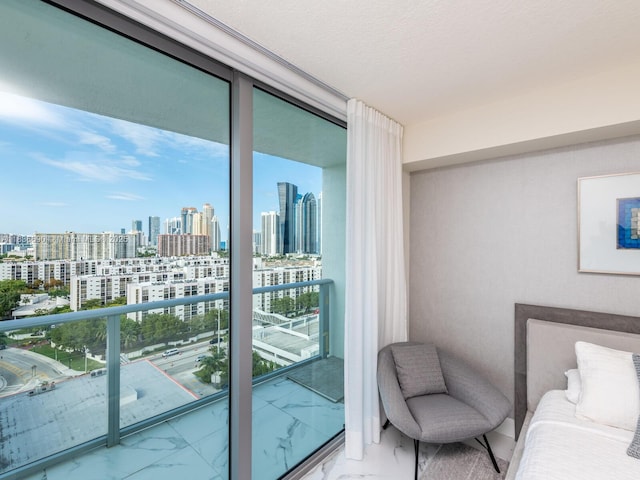 300 Sunny Isles Blvd Unit 5-1605, Sunny Isles Beach, FL 33160 - bedroom with a view of skyline, multiple windows, and marble finish floors