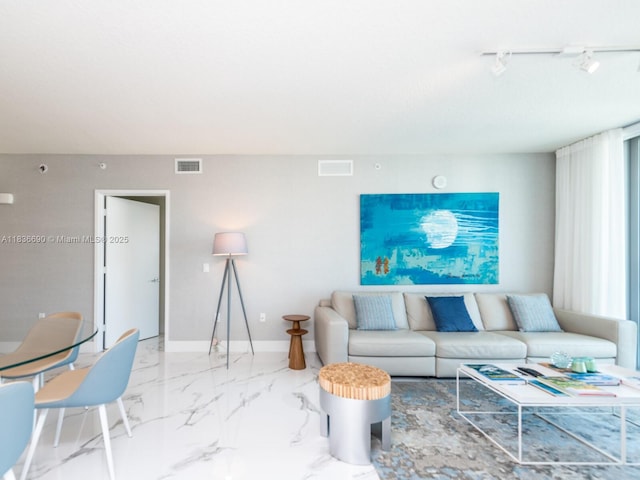 300 Sunny Isles Blvd Unit 5-1605, Sunny Isles Beach, FL 33160 - living area featuring track lighting and marble finish flooring