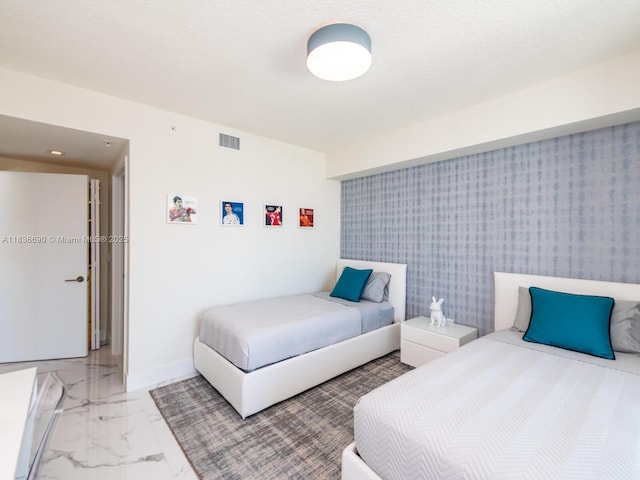 300 Sunny Isles Blvd Unit 5-1605, Sunny Isles Beach, FL 33160 - bedroom featuring light marble finish floors and wallpapered walls