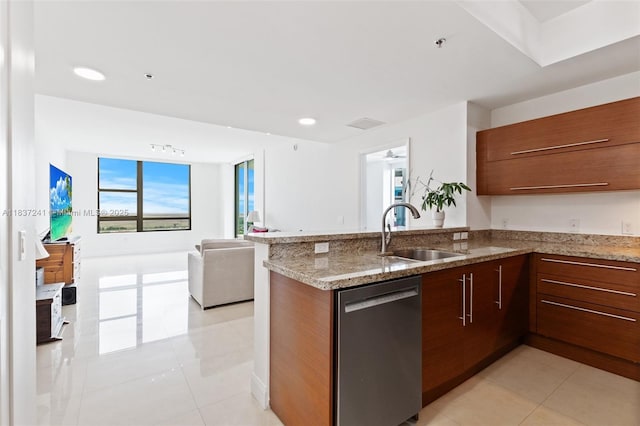 2681 N Flamingo Rd Unit 2508S, Sunrise, FL 33323 - kitchen featuring stainless steel dishwasher, light tile patterned flooring, a peninsula, modern cabinets, and light stone countertops