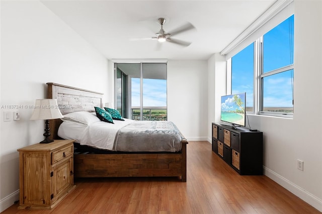 2681 N Flamingo Rd Unit 2508S, Sunrise, FL 33323 - bedroom with light wood finished floors and a ceiling fan