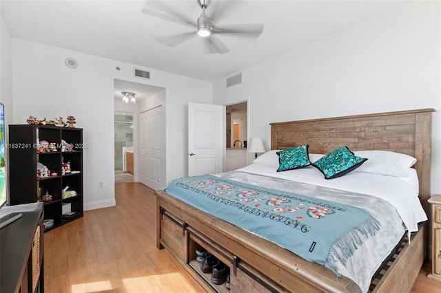 2681 N Flamingo Rd Unit 2508S, Sunrise, FL 33323 - bedroom with light wood-style floors, ensuite bathroom, ceiling fan, and a closet