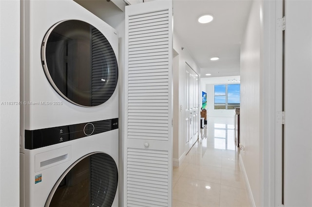 2681 N Flamingo Rd Unit 2508S, Sunrise, FL 33323 - laundry area with stacked washer / drying machine, light tile patterned flooring, and recessed lighting