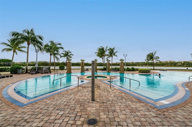 2681 N Flamingo Rd Unit 2508S, Sunrise, FL 33323 - view of swimming pool featuring a patio and a pool with connected hot tub