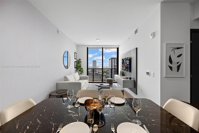 398 NE 5th St Unit 3219, Miami, FL 33132 - dining area with expansive windows