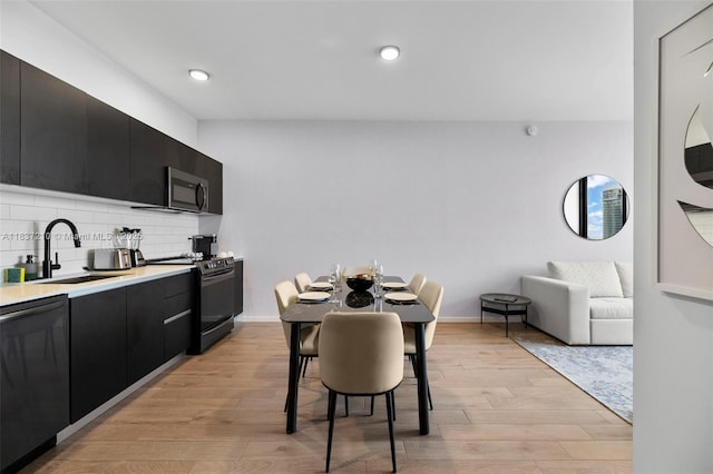398 NE 5th St Unit 3219, Miami, FL 33132 - dining room featuring light wood-style flooring and recessed lighting