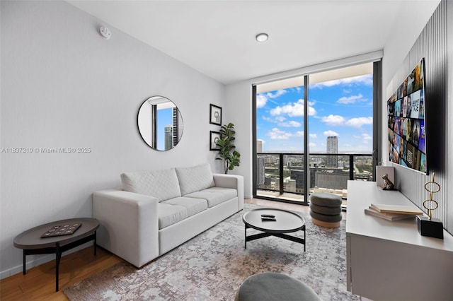398 NE 5th St Unit 3219, Miami, FL 33132 - living room with floor to ceiling windows and wood finished floors