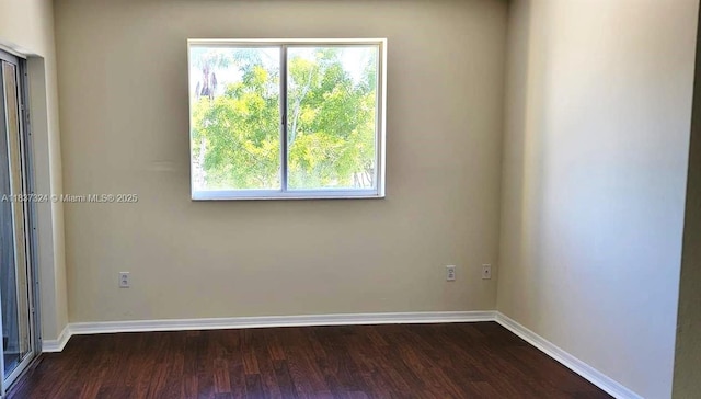2600 S University Dr Unit 307, Davie, FL 33328 - spare room with dark wood-style floors