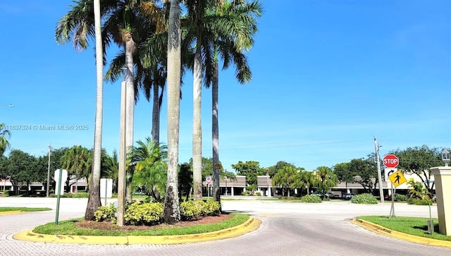 2600 S University Dr Unit 307, Davie, FL 33328 - view of decorative street featuring traffic signs and curbs