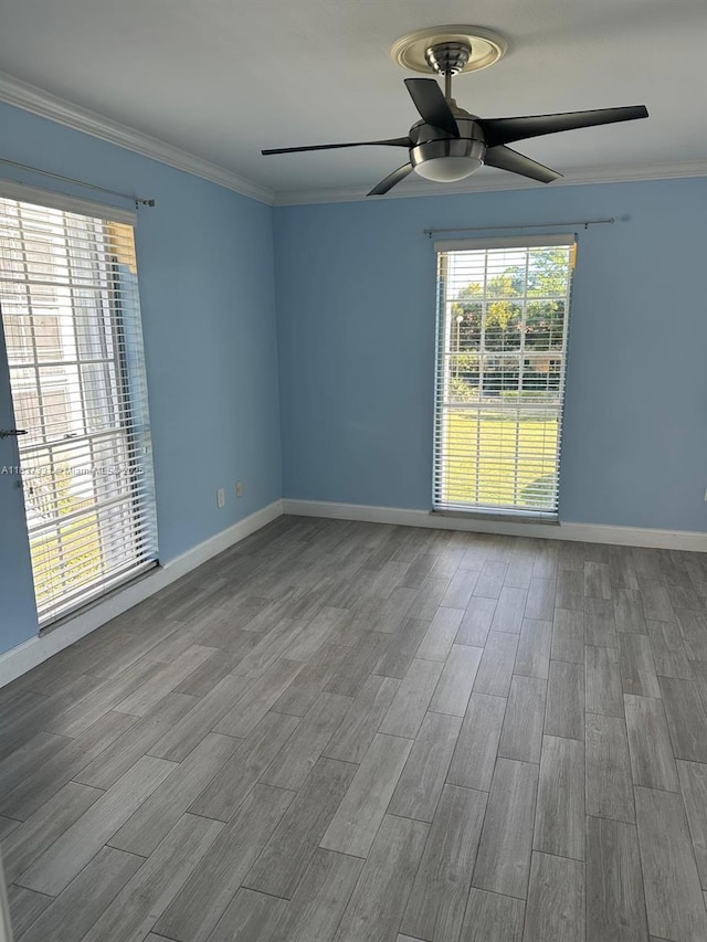 661 N University Dr Unit 1-201, Pembroke Pines, FL 33024 - empty room featuring ceiling fan, wood finished floors, and crown molding