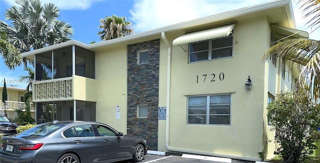 1720 Funston St Unit 111, Hollywood, FL 33020 - view of building exterior with uncovered parking