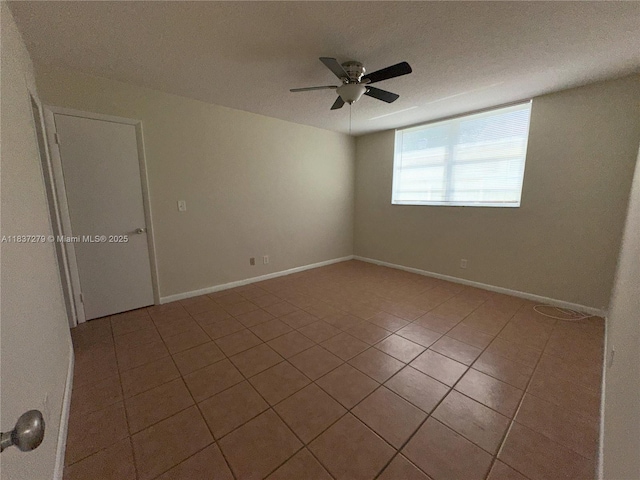 1720 Funston St Unit 111, Hollywood, FL 33020 - tiled empty room with ceiling fan and a textured ceiling