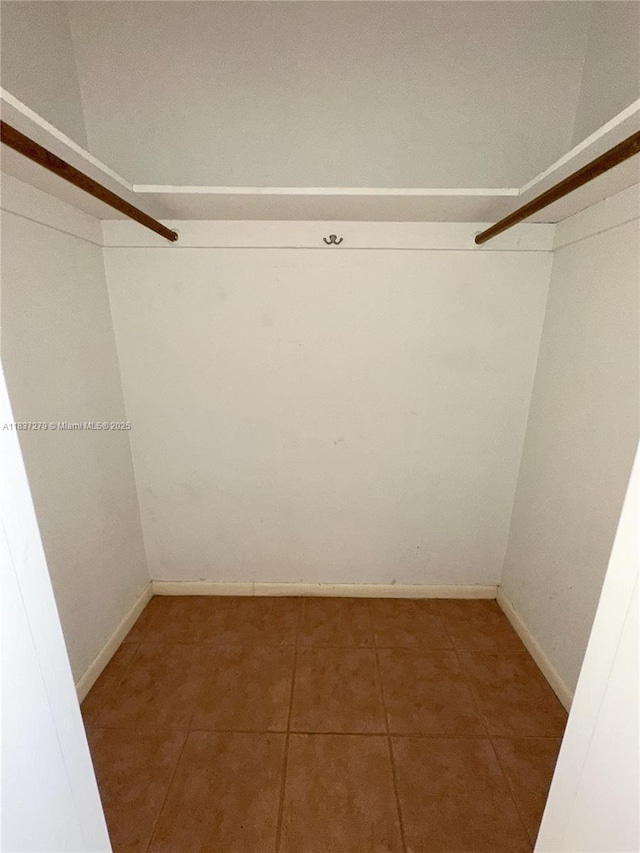 1720 Funston St Unit 111, Hollywood, FL 33020 - walk in closet with tile patterned floors