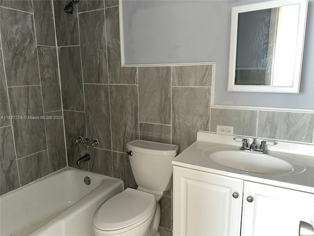 1720 Funston St Unit 111, Hollywood, FL 33020 - bathroom featuring vanity, tub / shower combination, and tile walls