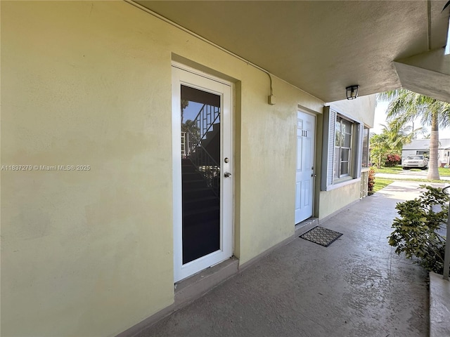 1720 Funston St Unit 111, Hollywood, FL 33020 - property entrance featuring stucco siding and a patio area