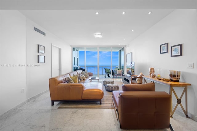 18201 Collins Ave Unit 1006, Sunny Isles Beach, FL 33160 - living room with expansive windows and recessed lighting