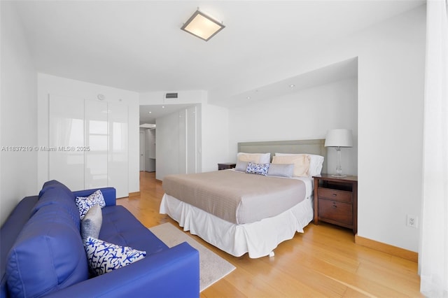 18201 Collins Ave Unit 1006, Sunny Isles Beach, FL 33160 - bedroom with light wood-type flooring