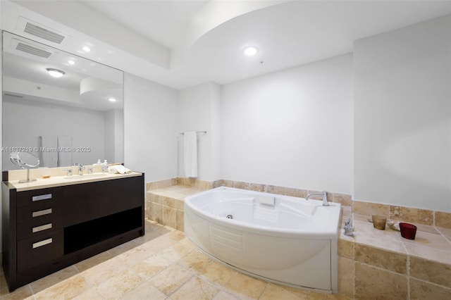 18201 Collins Ave Unit 1006, Sunny Isles Beach, FL 33160 - full bath with vanity, a whirlpool tub, recessed lighting, and stone tile floors