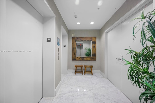 18201 Collins Ave Unit 1006, Sunny Isles Beach, FL 33160 - corridor featuring elevator, marble finish flooring, and recessed lighting
