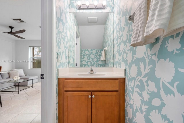 4326 Braxton Ave, West Palm Beach, FL 33417 - bathroom featuring wallpapered walls, vanity, a ceiling fan, and tile patterned flooring