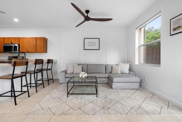 4326 Braxton Ave, West Palm Beach, FL 33417 - living room with a ceiling fan and baseboards