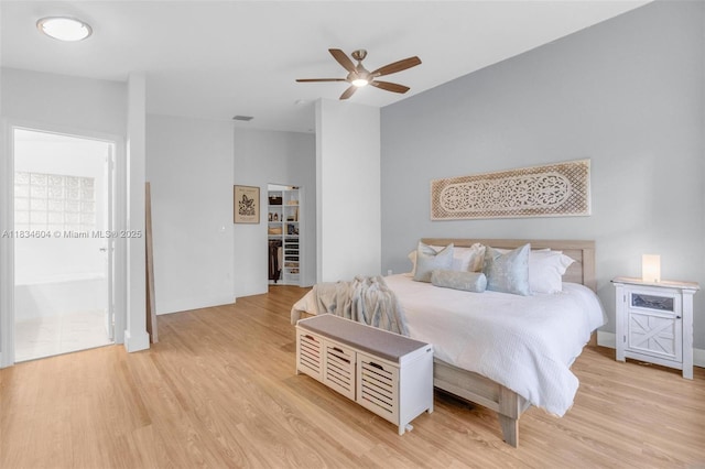 16410 Sapphire Bnd, Weston, FL 33331 - bedroom with light wood-style floors and ceiling fan