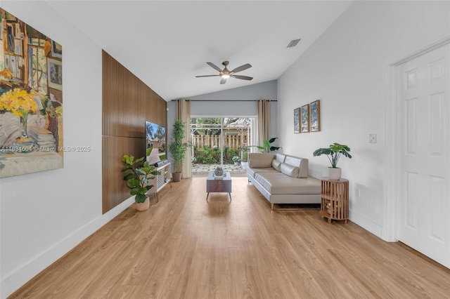 16410 Sapphire Bnd, Weston, FL 33331 - living area featuring a ceiling fan, light wood finished floors, and vaulted ceiling