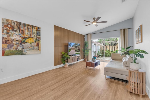 16410 Sapphire Bnd, Weston, FL 33331 - living area with ceiling fan, vaulted ceiling, and light wood finished floors