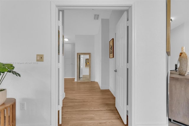 16410 Sapphire Bnd, Weston, FL 33331 - corridor with light wood finished floors and baseboards