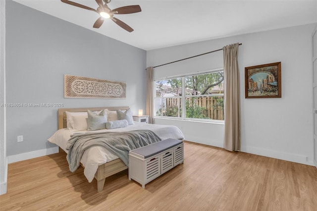 16410 Sapphire Bnd, Weston, FL 33331 - bedroom with light wood-type flooring and a ceiling fan