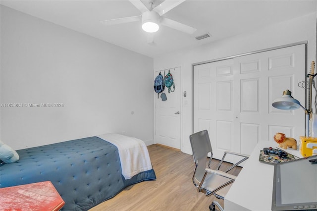 16410 Sapphire Bnd, Weston, FL 33331 - bedroom featuring a closet, light wood-type flooring, and ceiling fan