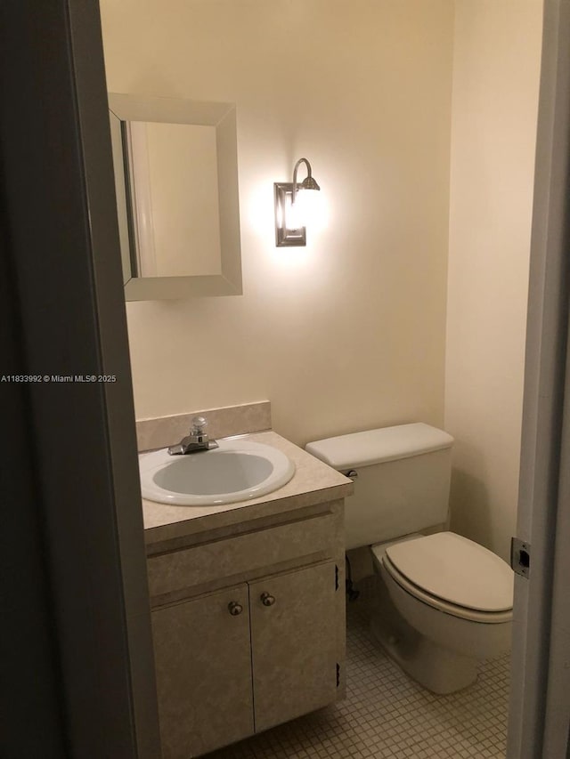 4000 N Hills Dr Unit 32, Hollywood, FL 33021 - half bath featuring vanity and tile patterned flooring