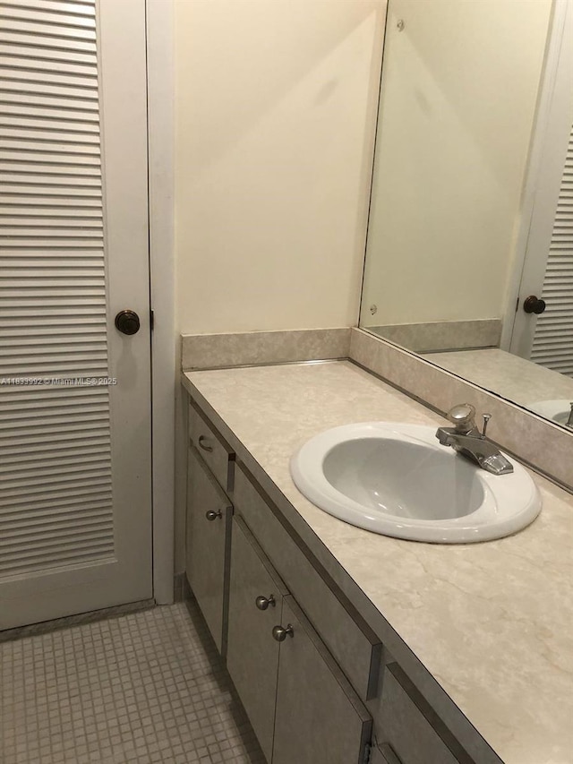 4000 N Hills Dr Unit 32, Hollywood, FL 33021 - bathroom with vanity and tile patterned flooring
