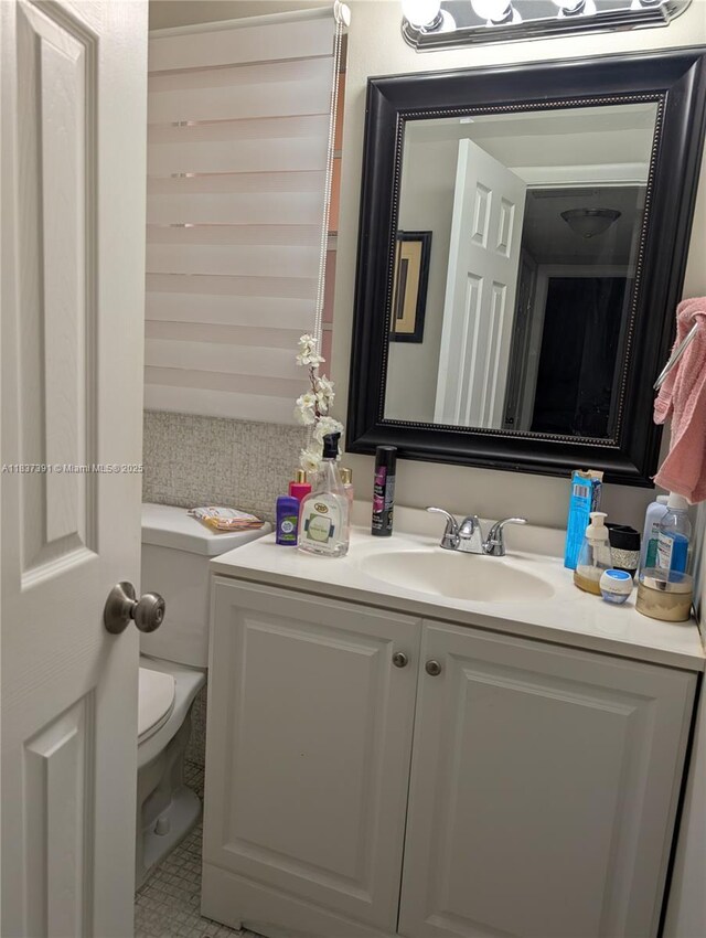 6751 Cypress Rd Unit 405, Plantation, FL 33317 - half bath with toilet and vanity
