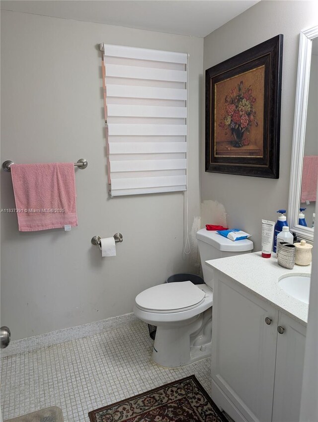 6751 Cypress Rd Unit 405, Plantation, FL 33317 - half bath with vanity and toilet