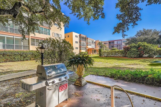 6751 Cypress Rd Unit 405, Plantation, FL 33317 - view of patio / terrace with area for grilling