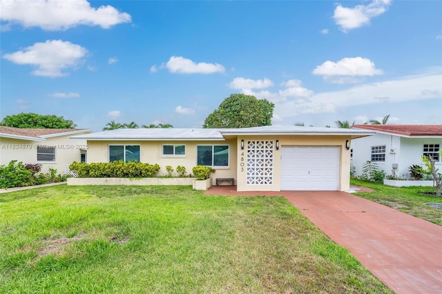 4803 NW 47th Ter, Tamarac, FL 33319 - single story home featuring an attached garage, stucco siding, a front yard, and driveway