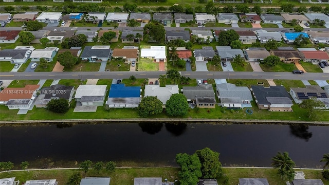4803 NW 47th Ter, Tamarac, FL 33319 - aerial view of property and surrounding area with a nearby body of water and nearby suburban area