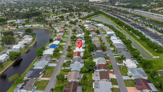 4803 NW 47th Ter, Tamarac, FL 33319 - aerial view of property and surrounding area with nearby suburban area and a nearby body of water
