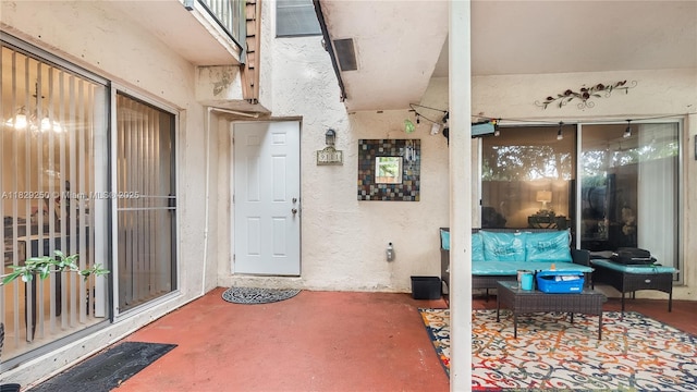 9111 SW 22nd Ct Unit B-3, Davie, FL 33324 - property entrance with stucco siding and a patio area