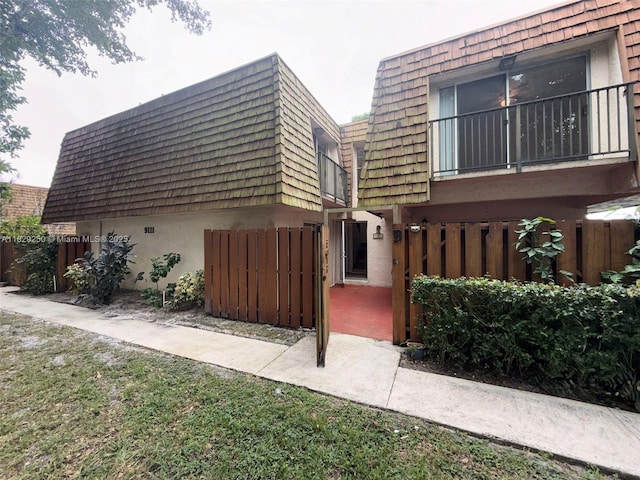 9111 SW 22nd Ct Unit B-3, Davie, FL 33324 - view of property exterior with mansard roof