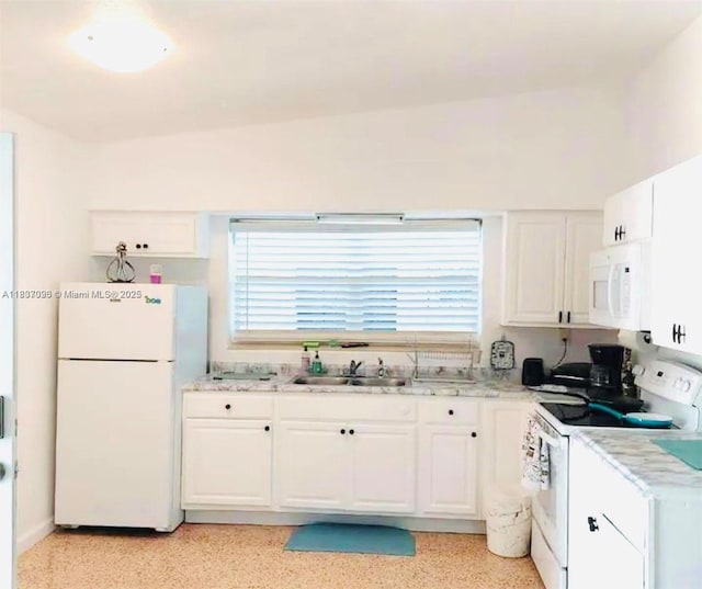1236 NE 109th St, Miami, FL 33161 - kitchen with white appliances and white cabinets