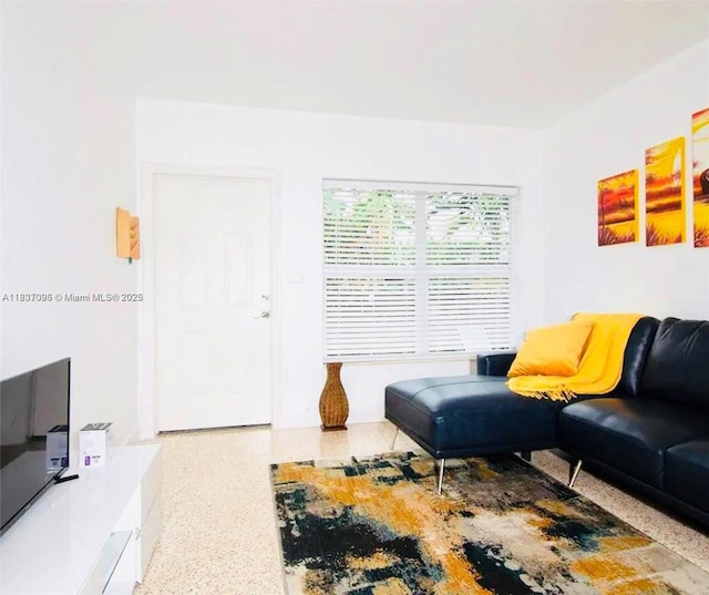 1236 NE 109th St, Miami, FL 33161 - living room featuring speckle patterned floor