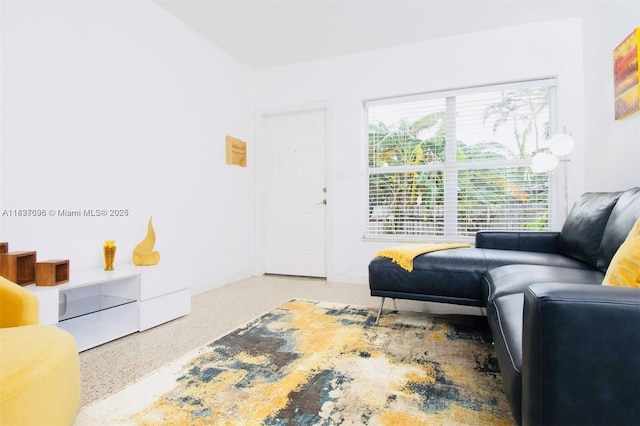 1236 NE 109th St, Miami, FL 33161 - living area with speckled floor and baseboards