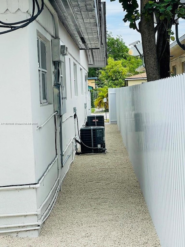 1236 NE 109th St, Miami, FL 33161 - view of side of home featuring a cooling unit
