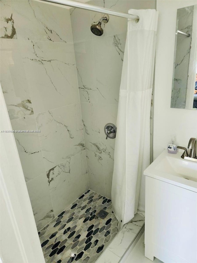 1236 NE 109th St, Miami, FL 33161 - full bathroom with a shower stall, marble look tile flooring, and vanity