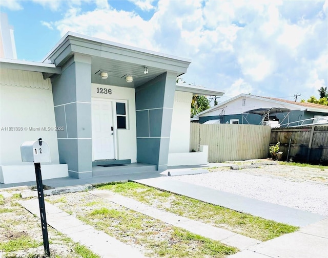 1236 NE 109th St, Miami, FL 33161 - entrance to property featuring stucco siding