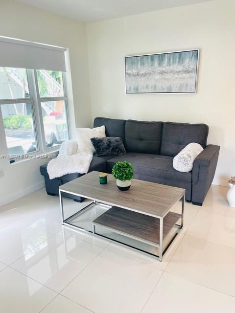1419 W Ave Unit 106, Miami Beach, FL 33139 - living area with tile patterned floors